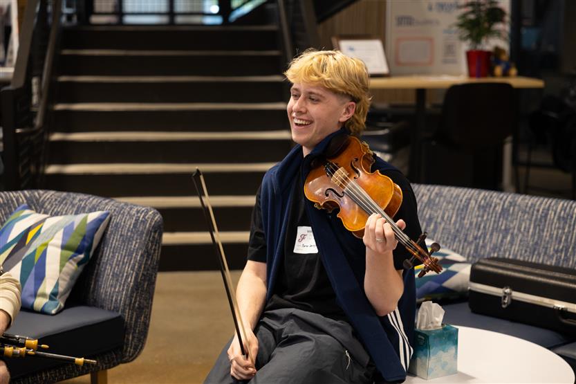 Students play in orchestra